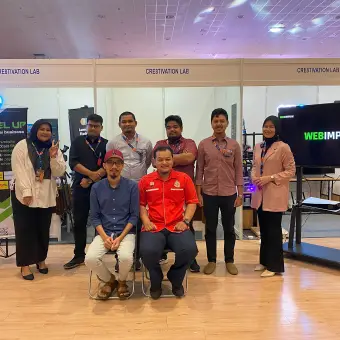 The Web Impian team at an industry expo